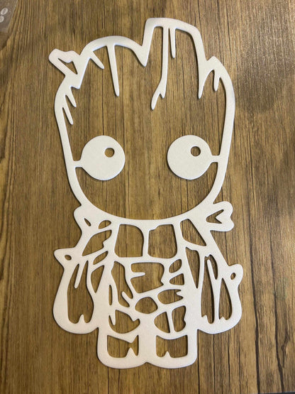 Baby Groot nursery decor cutout design on wooden background, perfect for adding charm to a nursery.