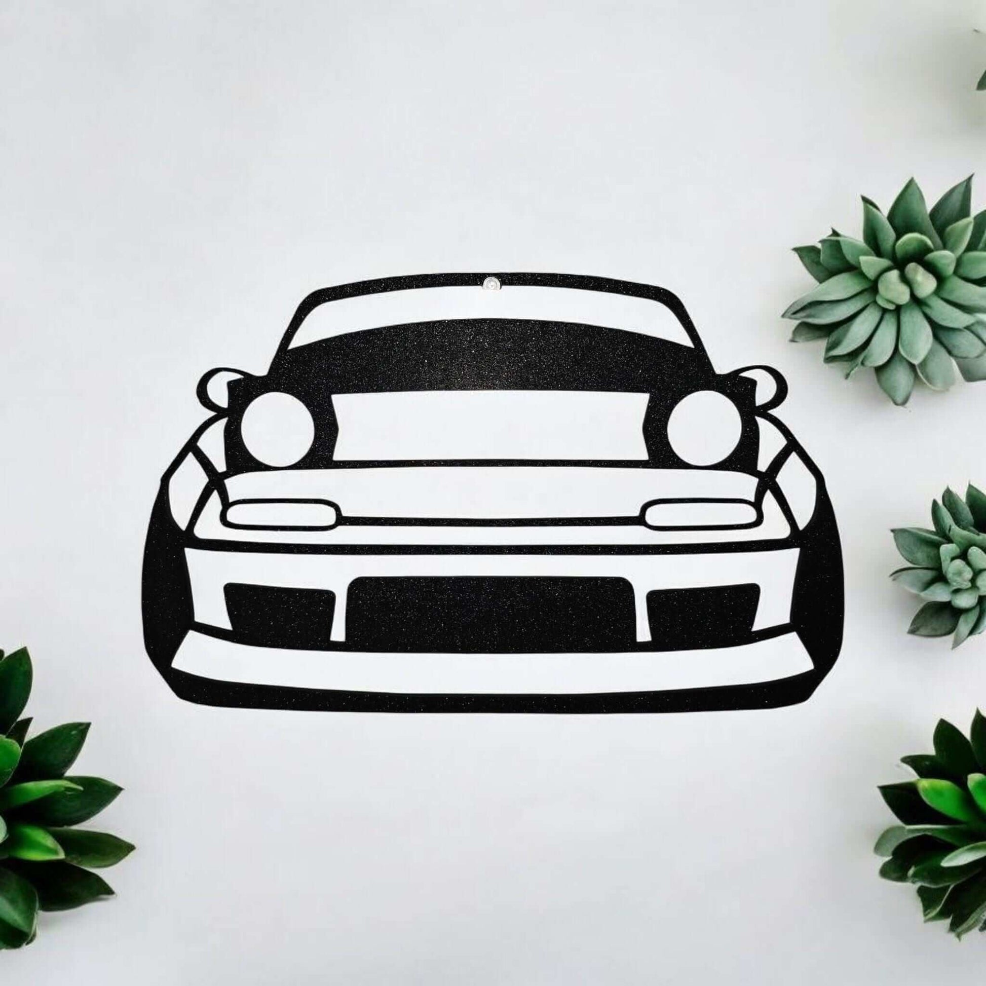 Mazda Miata wall decor featuring a black and white outline of the iconic sports car design.
