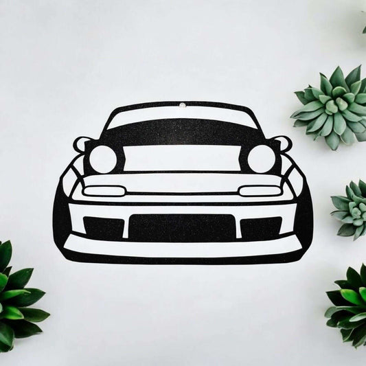 Mazda Miata wall decor featuring a black and white outline of the iconic sports car design.