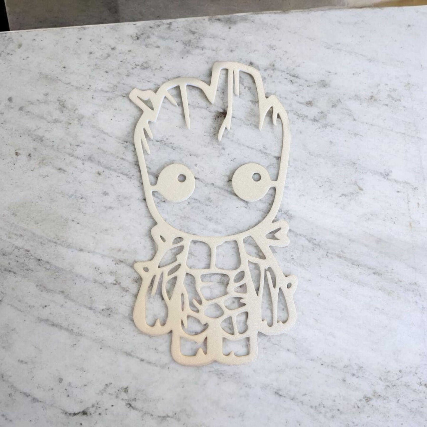 Baby Groot nursery decor on marble background, showcasing detailed 3D printed design.