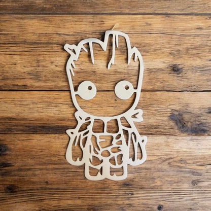 Baby Groot nursery decor displayed on wooden background, perfect for adding charm to a child's room.