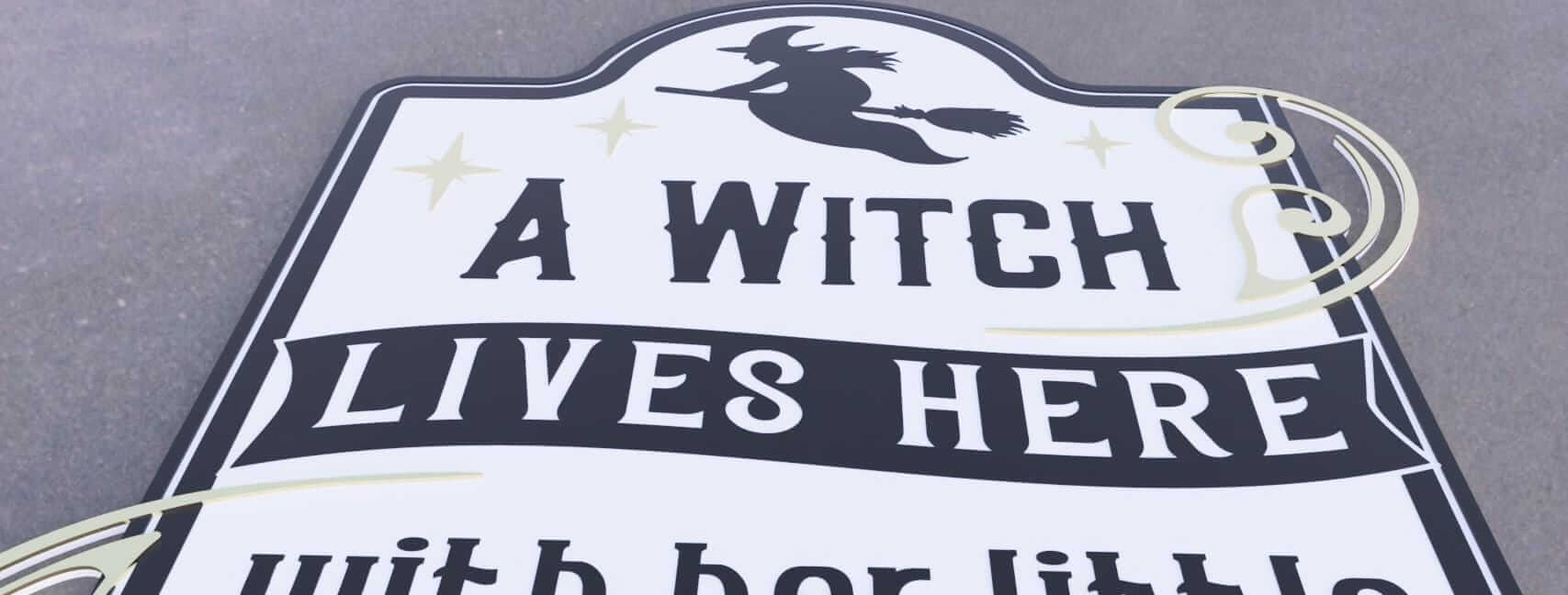 Halloween porch decor sign featuring a witch silhouette and playful text for festive Halloween decoration.
